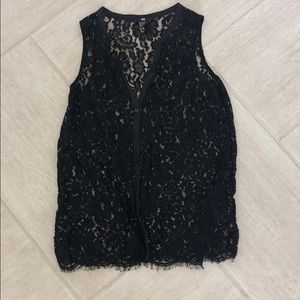 Sleeveless button down top